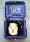 A high quality 14ct white gold cameo brooch unusually set with diamond necklace, 45 mm x 35 mm.