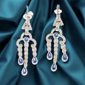 A pair of diamond and sapphire chandelier drop earrings, in the Art Deco style,