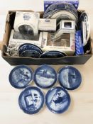 A group of Ringtons blue and white collector's plates, boxed caddies and other wares.