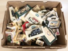 A collection of boxed Lledo die cast vehicles.