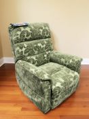 An electric reclining armchair.