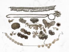 A collection of silver jewellery including filigree items,