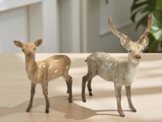 A Beswick stag and a doe,