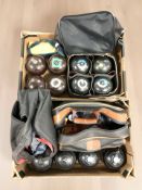 A collection of lawn boules including Taylor and Hensell & Sons.