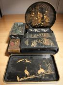 A group of Japanese Meiji period export lacquered boxes and trays.
