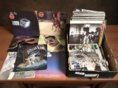 Vinyl LP records including Meatloaf, Genesis, Freddie Mercury, The Carpenters, Tina Turner,
