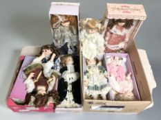 A group of modern collector's dolls.