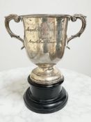 Morpeth Interest : A George V silver twin-handled trophy cup on stand, Deakin & Francis Ltd,