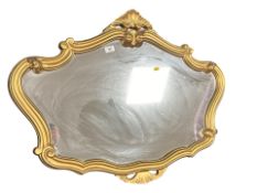 A Rococo style mirror, 92 cm x 69 cm.
