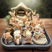 A group of Pendelfin rabbits.