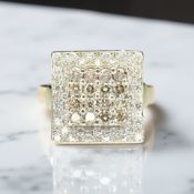 A heavy 18ct yellow gold diamond cluster ring,