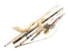 A group of fishing rods, gaff, etc.