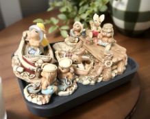 A group of Pendelfin rabbits.