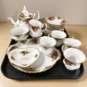 Twenty one pieces of Royal Albert old country roses tea china.