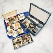 A quantity of costume jewellery including wristwatches, dress rings, compacts, brooches,