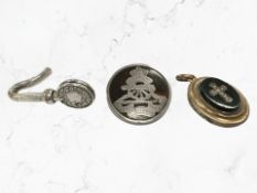 A silver and tortoiseshell Royal Artillery brooch together with a Georgian mourning locket and a