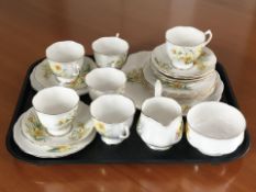 Twenty one pieces of Royal Albert Friendship Daffodil tea china.