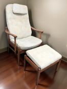 A Danish Farstrup armchair, with matching storage footstool.