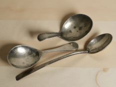 A Georgian silver caddy spoon, length 6.5 cm, a later caddy spoon and teaspoon.