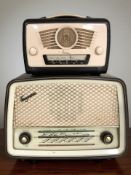 A Ferguson Bakelite-cased valve radio and a similar Ultra radio.
