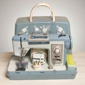 A Jones Deluxe electric sewing machine.
