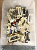 A collection of boxed Lledo die cast vehicles.