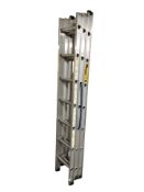 An aluminium triple extension ladder.