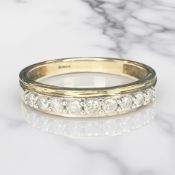 A 9ct gold diamond half eternity ring, size N CONDITION REPORT: 2.