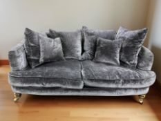 A modern three piece lounge suite comprising three seater settee, length 200 cm,