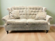 A Victorian style three piece lounge suite in floral fabric, settee 172 cm long.