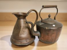 A Victorian copper kettle and a further jug.
