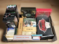 Assorted games including poker sets, dominoes, playing cards, etc.