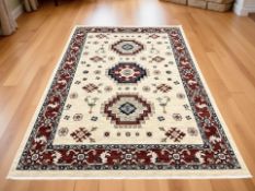 A brand new Nomad 100% wool carpet, 240 cm x 340 cm.