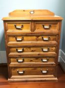 A modern pine six drawer chest,