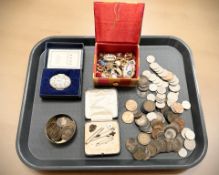 A Halcyon Days enamelled pill box in case, a small quantity of costume jewellery and badges,