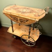 An Italian inlaid drinks trolley.
