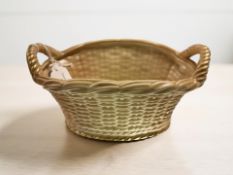A Royal Worcester blush ivory twin handled basket, pattern 2365, width 19 cm.