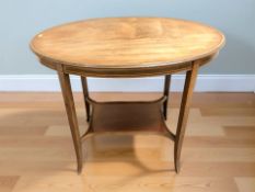 An Edwardian oval mahogany occasional table, width 88 cm.