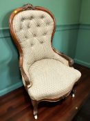 A Victorian carved walnut lady's salon chair.