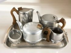 A five piece Picquot tea service and matching tray.