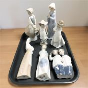 Seven various unboxed Nao figures.