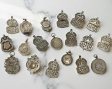 A large quantity of silver medallions, ARP badges etc. CONDITION REPORT: 178.