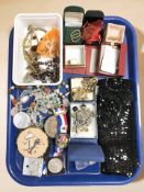 Assorted costume jewellery, gilt metal chains, bead necklaces, dress rings, compact,