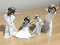 Four Lladro figures of angels, tallest 24 cm.