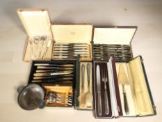 Several cases and canteens of French EPNS cutlery, an EPNS twin handled bowl.