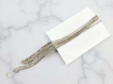 A group of silver and silver-gilt necklaces