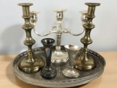 An EPNS oval galleried tray, candelabrum, two bud vases, a pair of brass candlesticks.