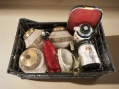 A group of light shades, soda siphon, brass light fixtures, two Vogue vacuum bottles, drinks tray,