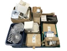 A quantity of assorted lighting, kitchen fans, door chimes,