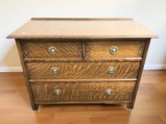 An Edwardian oak four drawer chest,